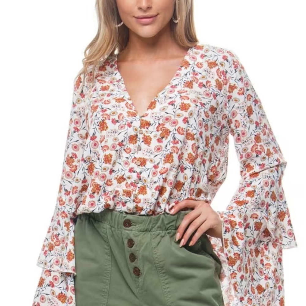 Free People floral body suit. Size small